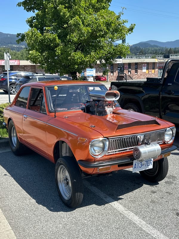 Custom orange Toyota Corolla spotted in Port Moody parking lot