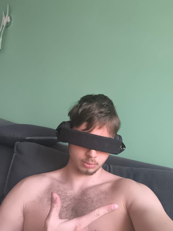 Young man documents personal photo session in Sofia apartment