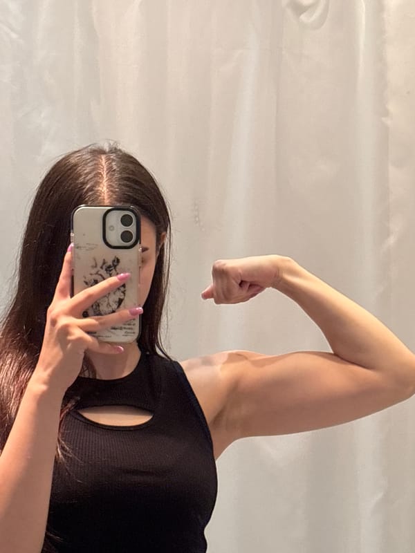 Person Takes Flexing Mirror Selfie in Polena, Bulgaria