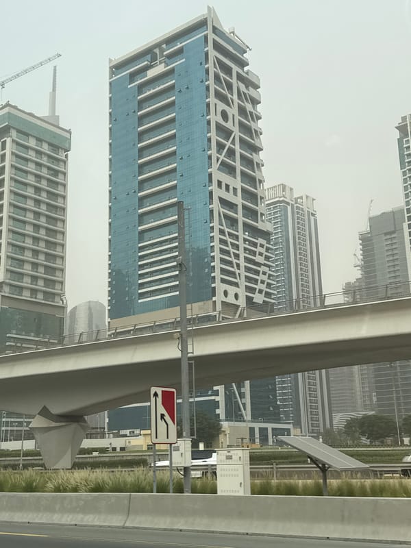 Dubai skyline on a hazy afternoon, highways and high-rises