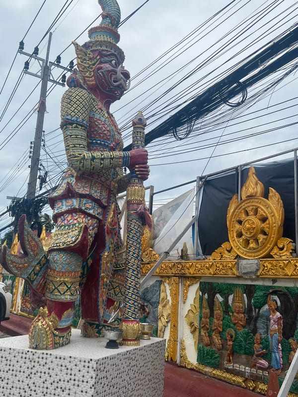Road trip past Thai temples, markets, and guardian statues