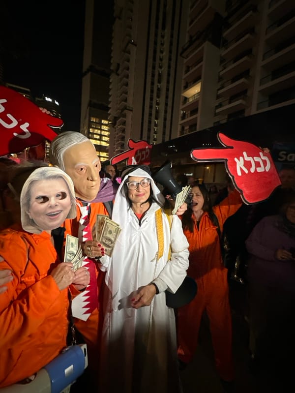Nighttime protest with political masks, signs draws crowds in Tel Aviv