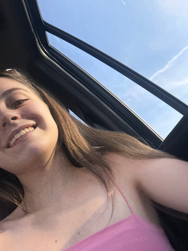 Woman takes selfies through car sunroof in Burgas