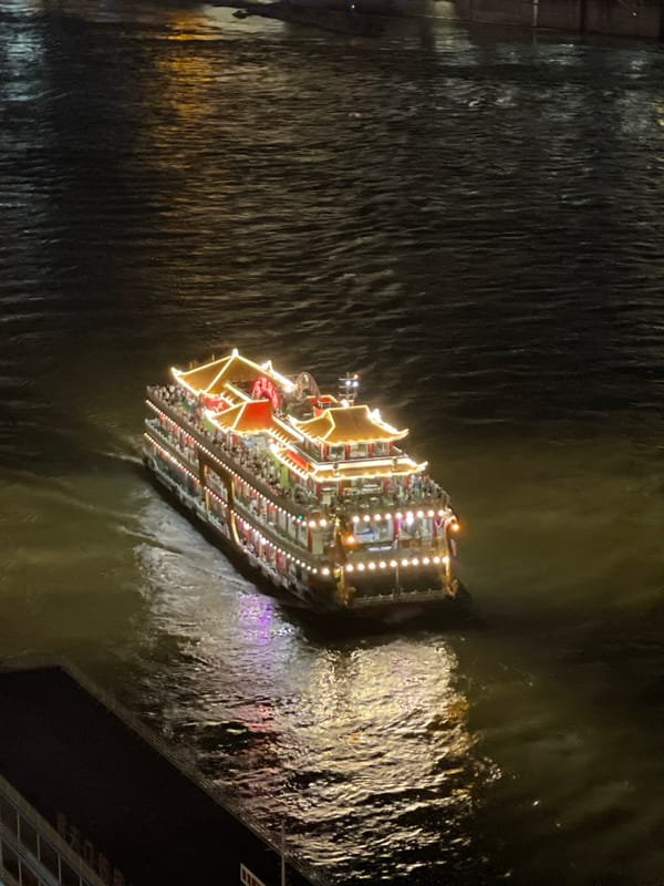 Chongqing's Yuzhong District at night — river boats, bridges, skyline