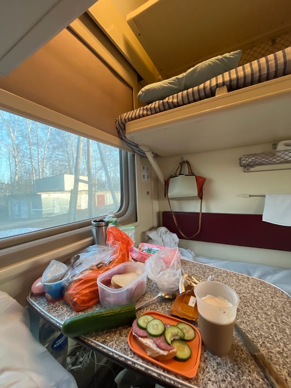 Train compartment interior captured during daytime journey in Ulyanovsk