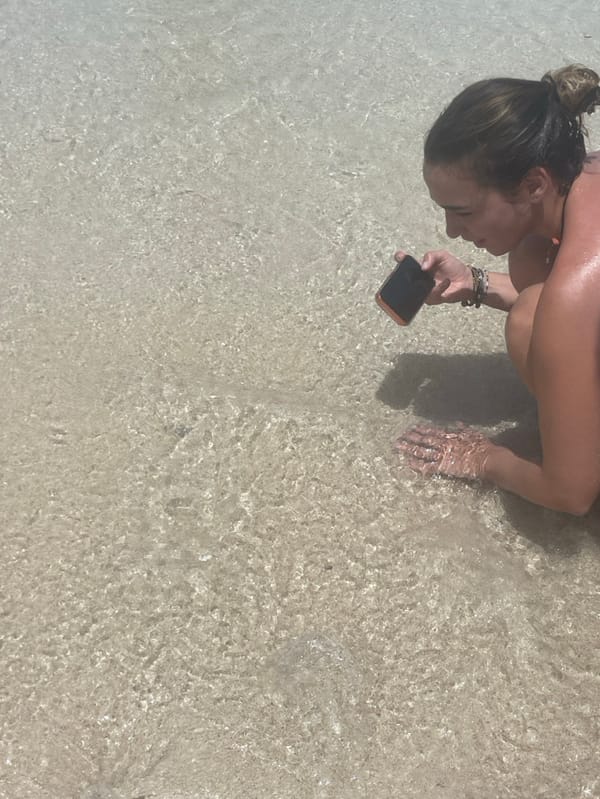 Beachgoers enjoy sunny morning at Zanzibar's turquoise coastline