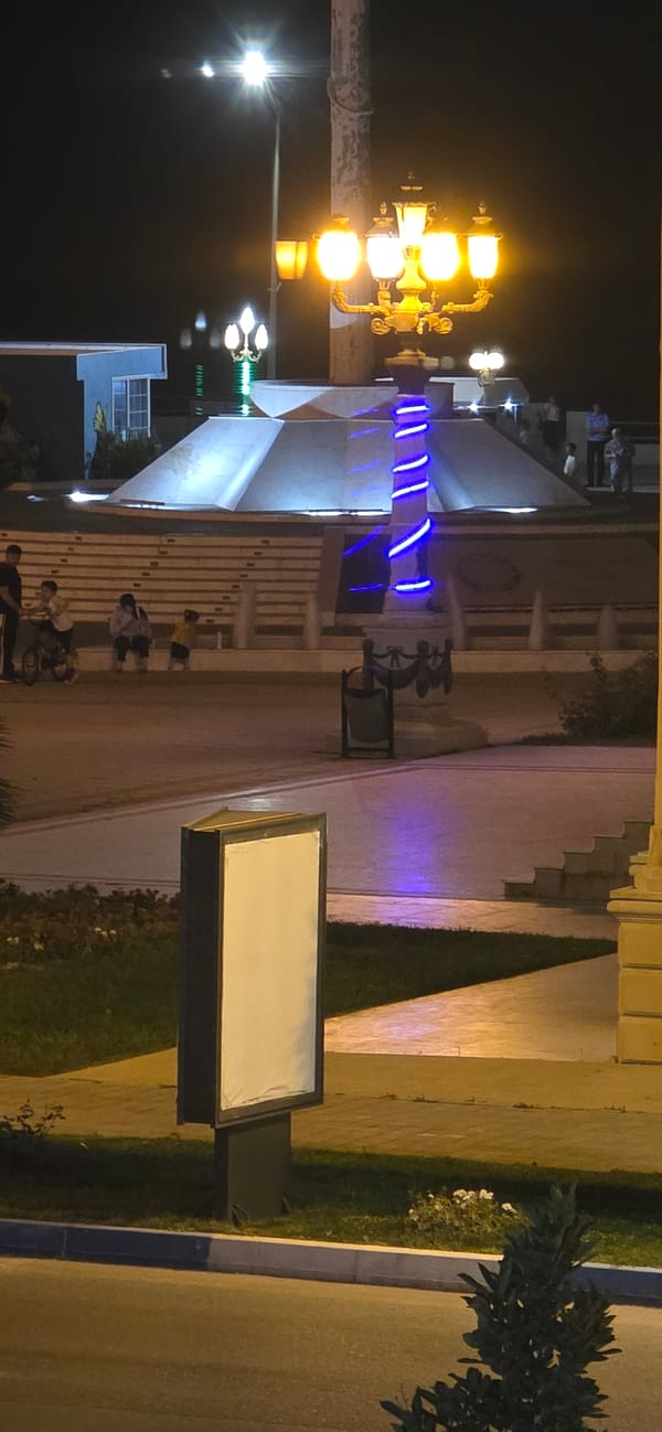Summer evening on the Sumgayit promenade, fountains and all