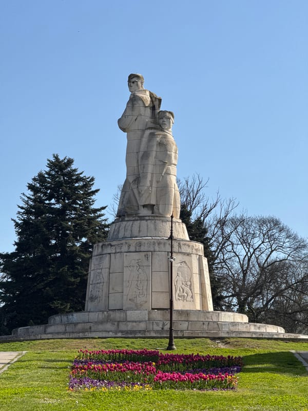 Spring blooms frame war memorial in Varna park
