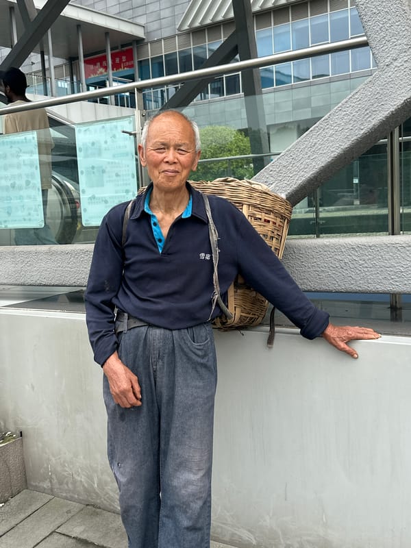 Elderly man with basket, motorcycle spotted in Jiangjin morning