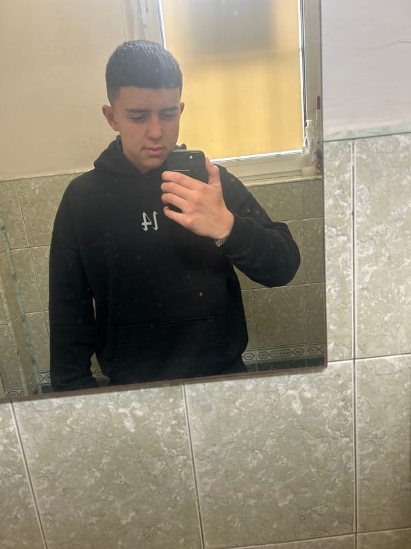 Young man takes mirror selfie in Zlatograd