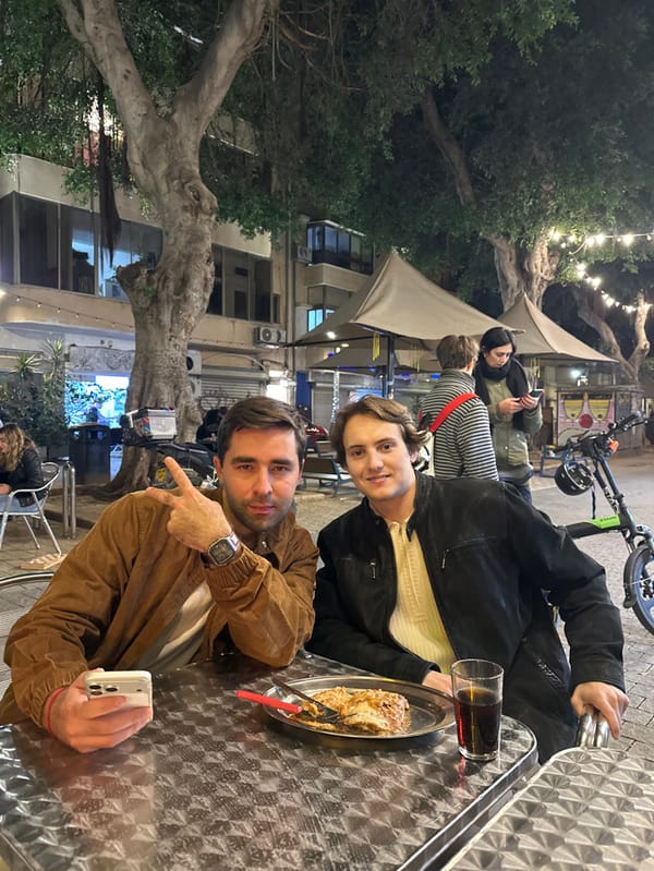Friends gather for casual evening dining in Tel Aviv
