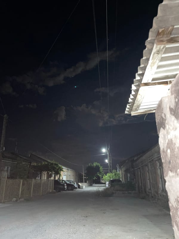 Nighttime look up at a corrugated metal roof in Armavir
