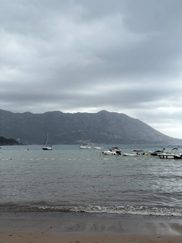 Cloudy morning at Budva's waterfront Ferris wheel