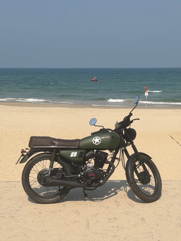 Vintage Honda motorcycle spotted on Đà Nẵng beach