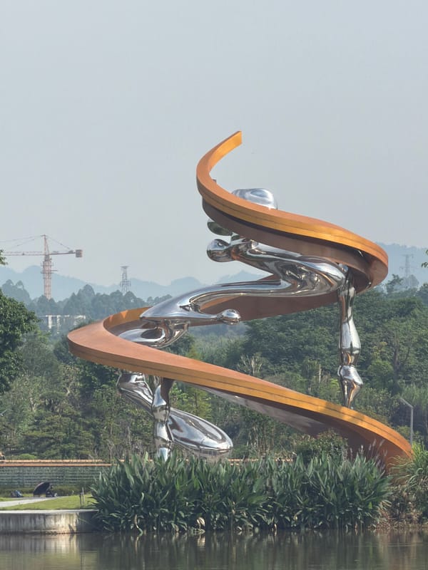Bishan park lakefront busy with cyclists, paddleboats, and walkers