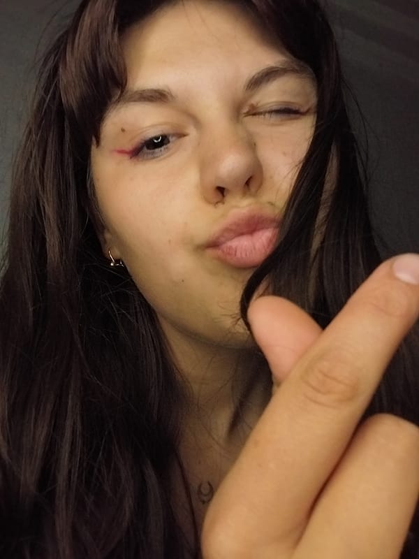 Close-up selfie series with tattoos and playful poses