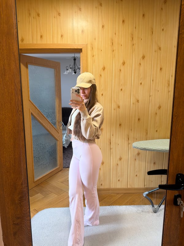 Woman takes mirror selfie in Buhovo, Bulgaria