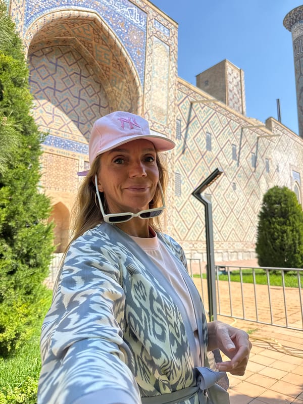 Tourist captures selfie at historic Samarkand minarets