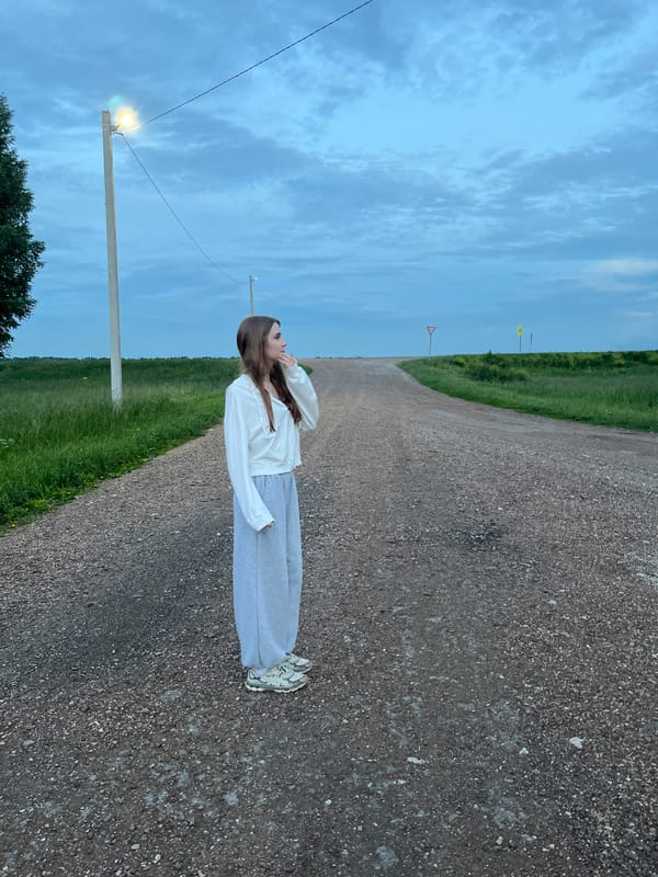 Woman walks dog, takes selfies in rural Russia