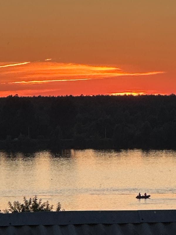 Kama River sunset and apple trees in Chaikovsky, Russia