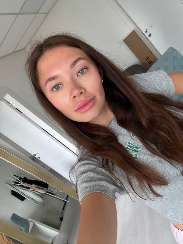 Woman takes morning selfie in Ramat Gan bathroom