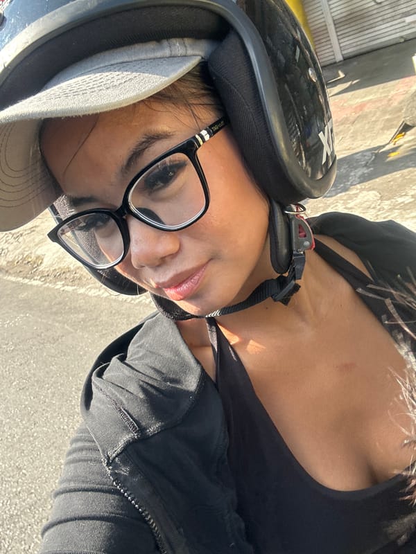 Scooter ride through Sukawati's Balinese streets on a clear morning