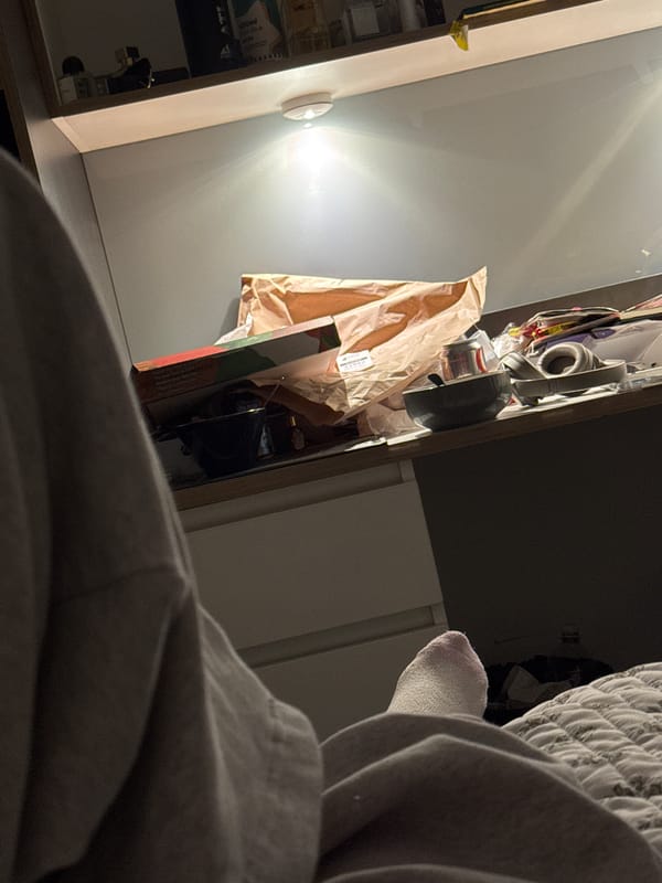 Person relaxing in bedroom captured in Hull late night