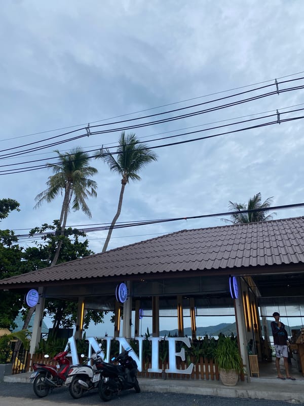 Tourist documents quiet coastal moments in Thai fishing village