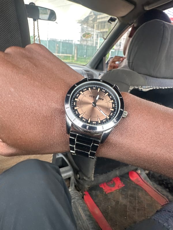 Driving through Abuja streets on a grey afternoon