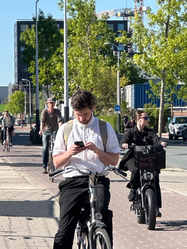 Amsterdam residents document ordinary Friday afternoon urban life