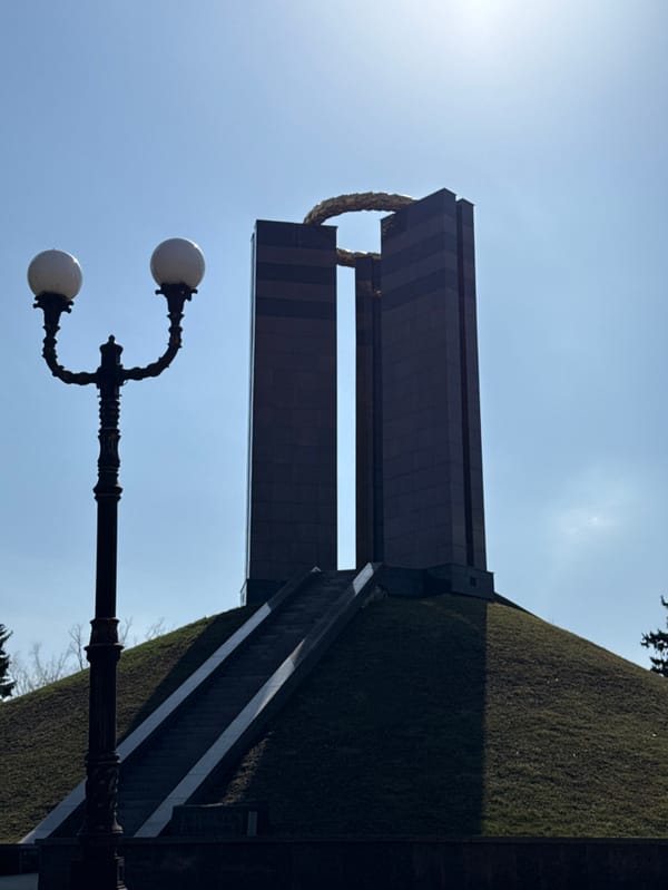 Woman documents sunny morning visit to central Donetsk landmarks