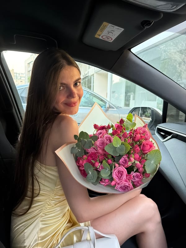 Pink roses, a panther statue, and a dressed-up afternoon out