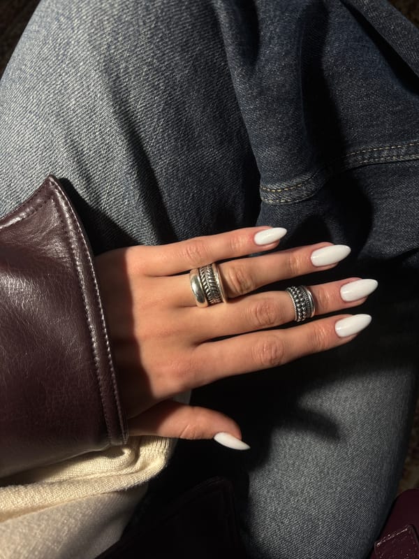 Person with white manicured nails photographed in Yerevan