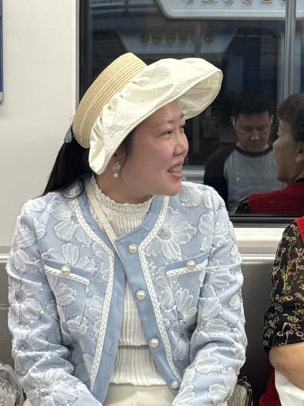 Tourists visit ancient stone carvings in Jiulongpo District