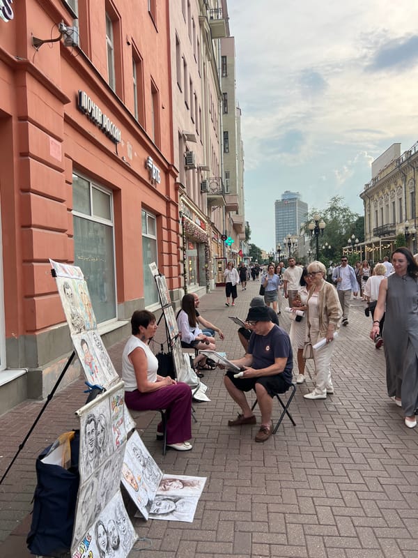 Moscow street life unfolds around art installations and performers