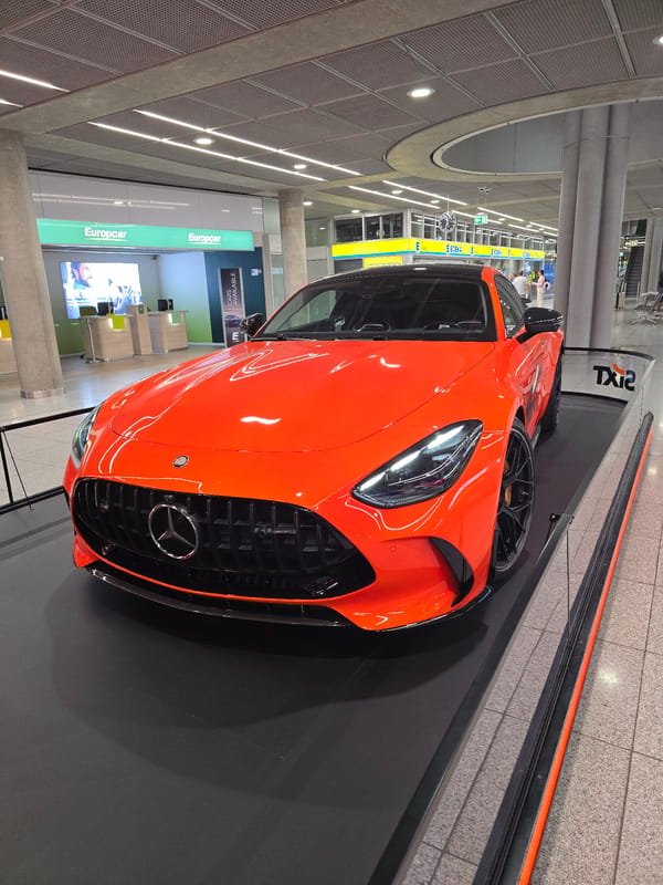 Orange Mercedes-AMG GT on display at Stuttgart Airport