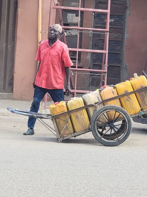 Daily life unfolds on Maiburiji streets
