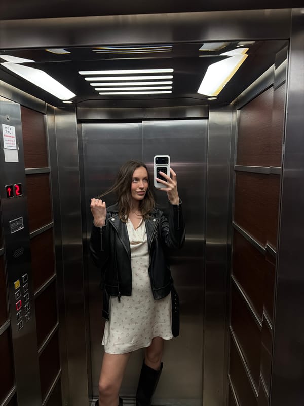 Woman photographed in elevator and outdoors in Budva