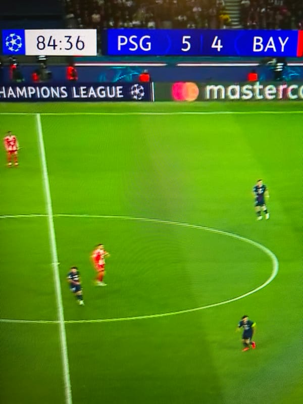 Football match broadcast viewed on screen in Eindhoven