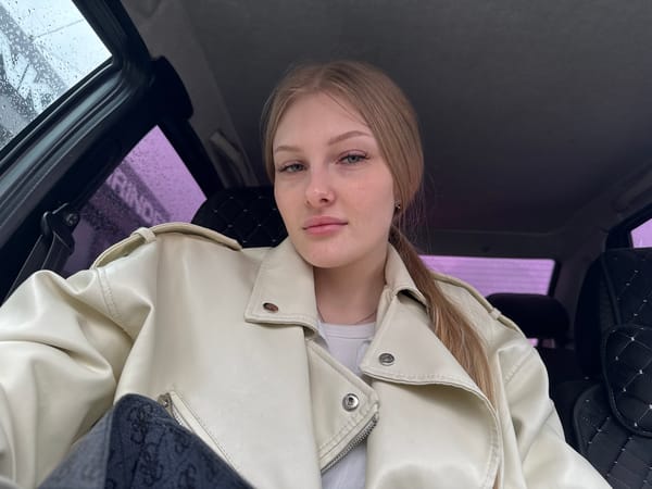 Young woman photographed during brief car journey in Perm