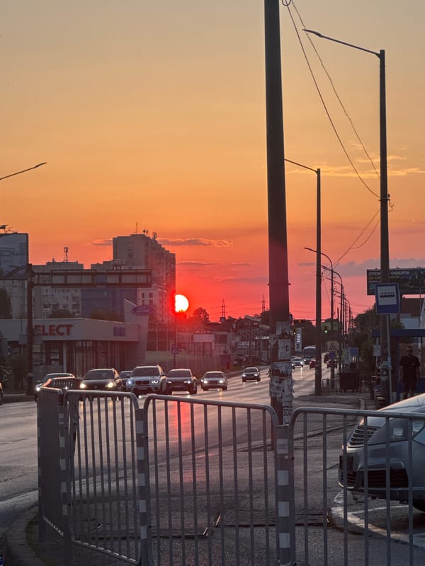 Sun and full moon share the Sofia evening sky