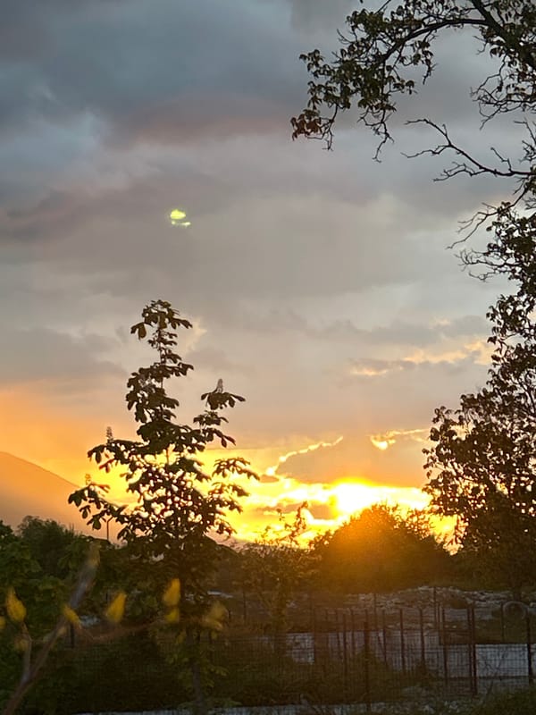 Sunset observed over Bansko, Bulgaria with colorful cloudy sky