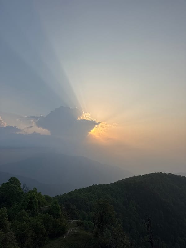 Mountain views documented in Kande, Nepal show misty peaks