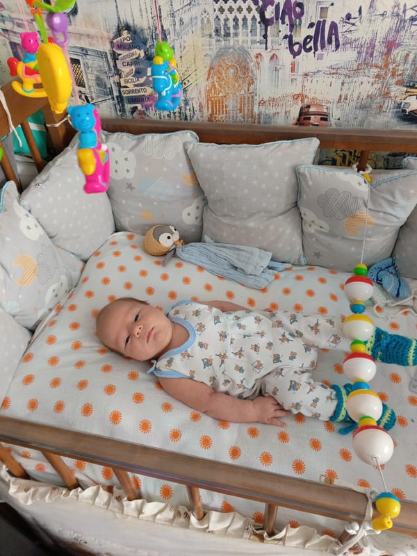 Newborn observed in crib during morning hours in Andreyevo