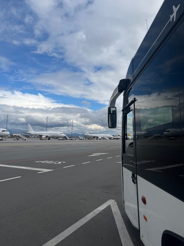 Bus passenger observes aircraft at Sofia Airport tarmac
