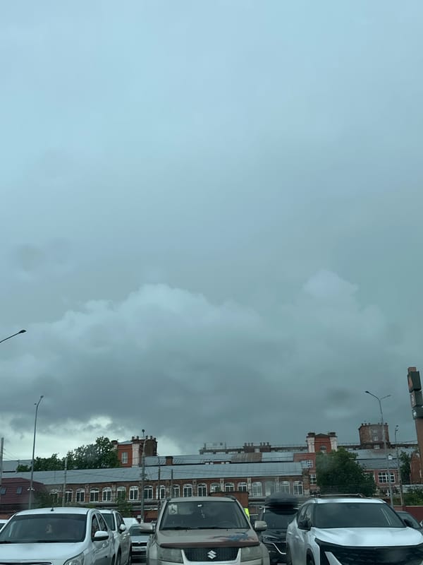 Rainy day in Podolsk, from wet streets to a mall interior.