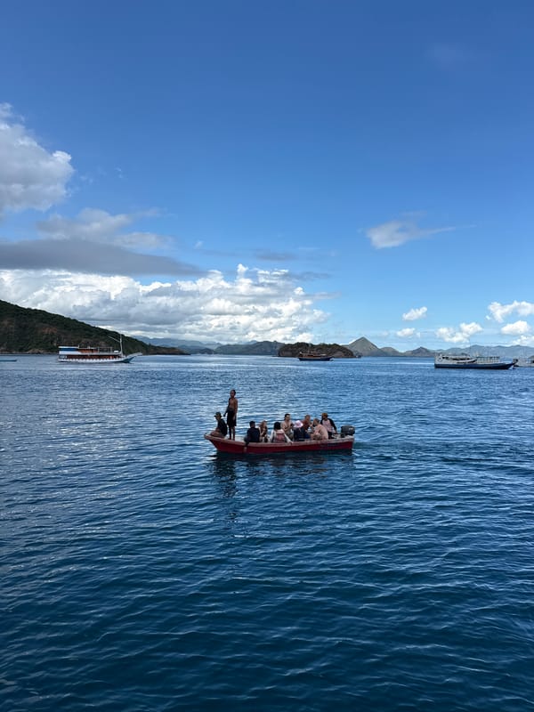 Passenger transfer between boats off Indonesian coast