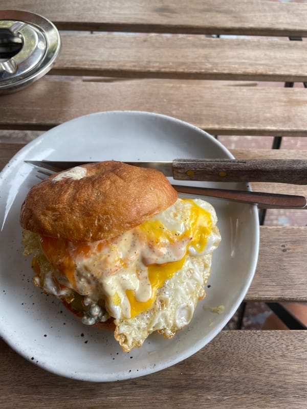 Morning scenes captured in Chiang Mai: breakfast meal, urban vegetation