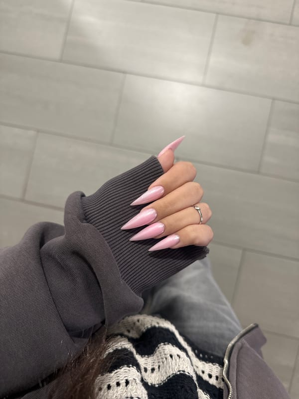 Person with pink manicured nails spotted near photo display in Yerevan