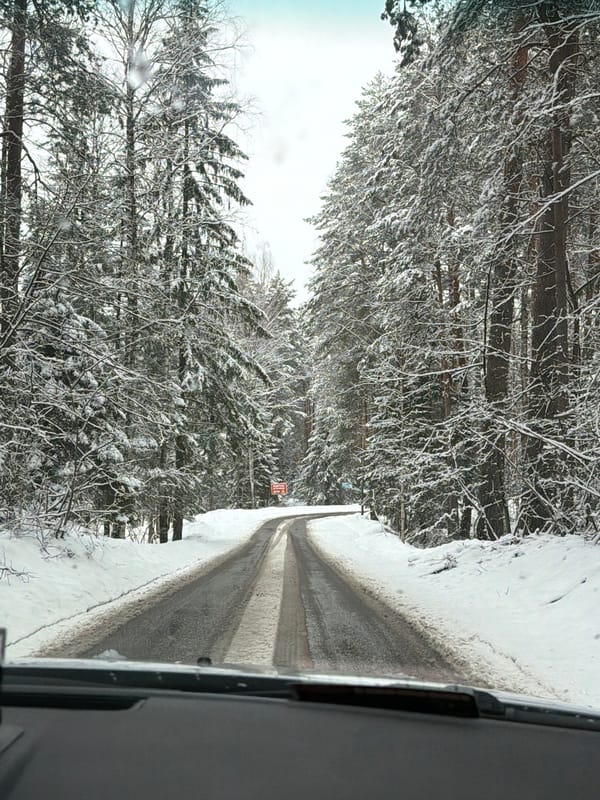 Spring snow blankets Chaykovsky forest roads in Russia